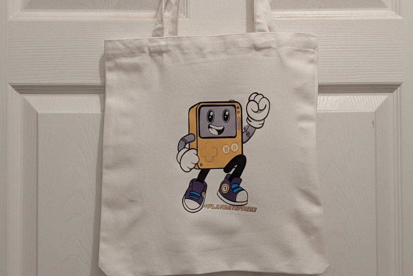 Tote bag with a cartoon character design on a white background